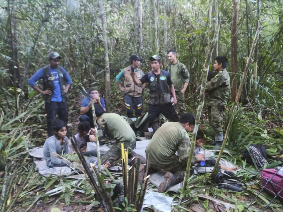 Rescue team celebrating finding the children in the Amazon