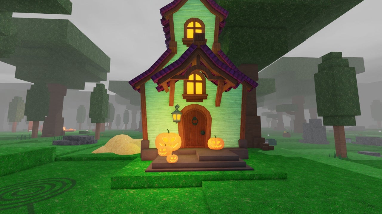 Lit house ready for trick or treating in 99 Nights in the Forest